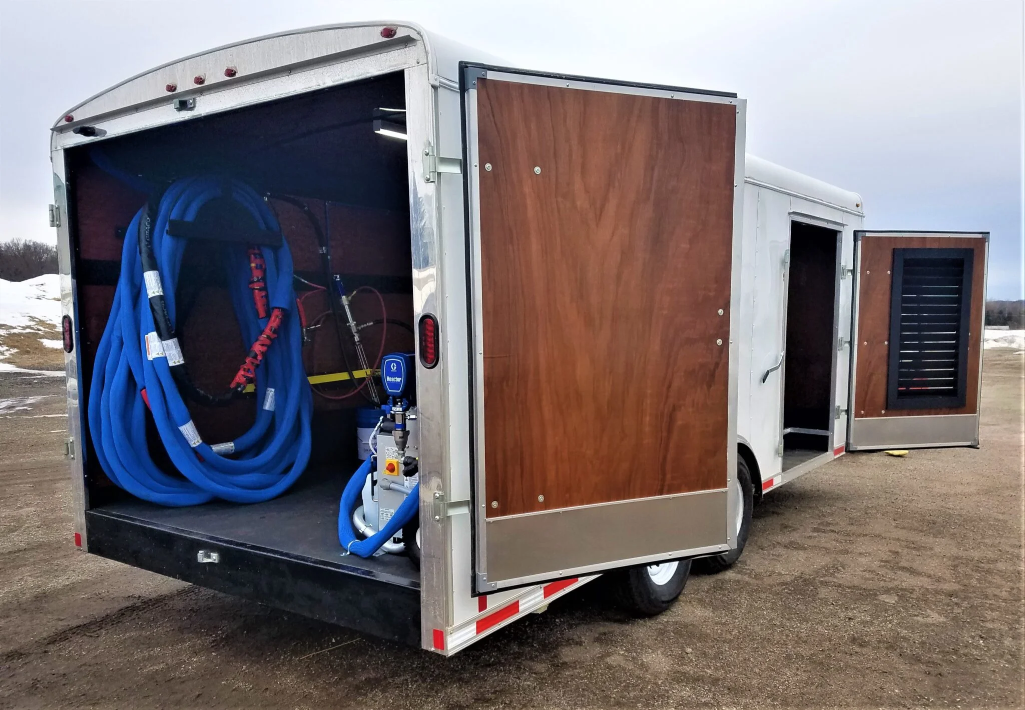 Custom spray rig build — equipment storage and hose reel configuration